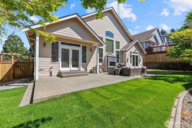 4002 33rd St NE, Tacoma, WA 98422 - rear view of house featuring french doors, an outdoor living space, and a patio