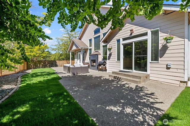 4002 33rd St NE, Tacoma, WA 98422 - back of house featuring a patio and outdoor lounge area