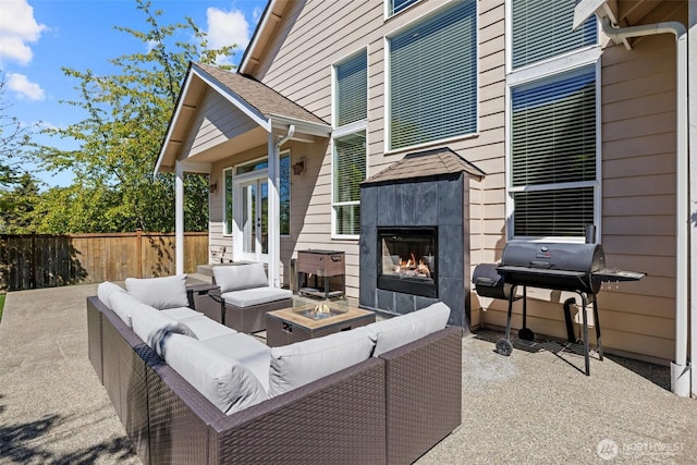4002 33rd St NE, Tacoma, WA 98422 - view of patio / terrace featuring an outdoor living space with a fireplace, a grill, fence, and french doors