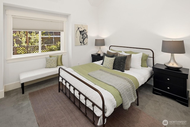 carpeted bedroom with baseboards