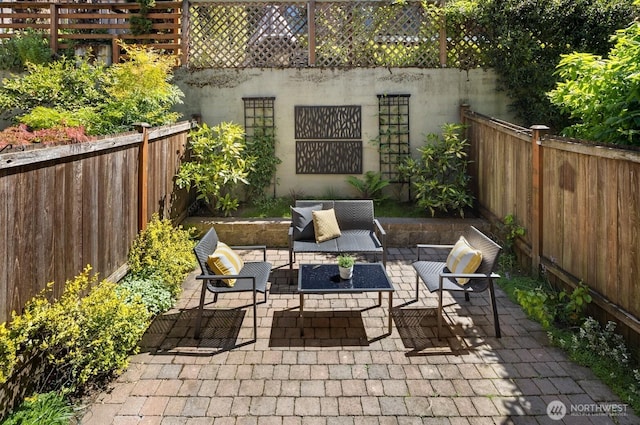 view of patio / terrace featuring a fenced backyard and outdoor lounge area