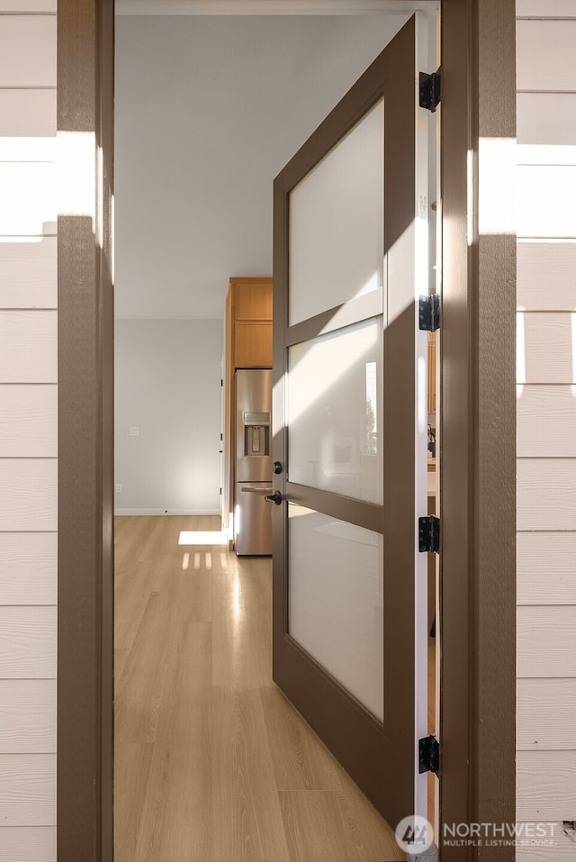 10604 NE 137th Pl, Kirkland, WA 98034 - corridor featuring light wood finished floors and baseboards