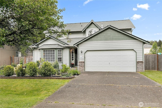 17915 69th Avenue Ct E, Puyallup, WA 98375 - traditional-style home featuring brick siding, a garage, driveway, and a shingled roof
