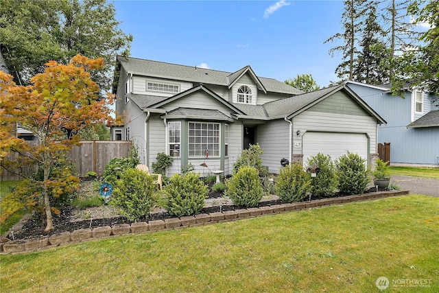 17915 69th Avenue Ct E, Puyallup, WA 98375 - traditional-style home with roof with shingles, a garage, and driveway