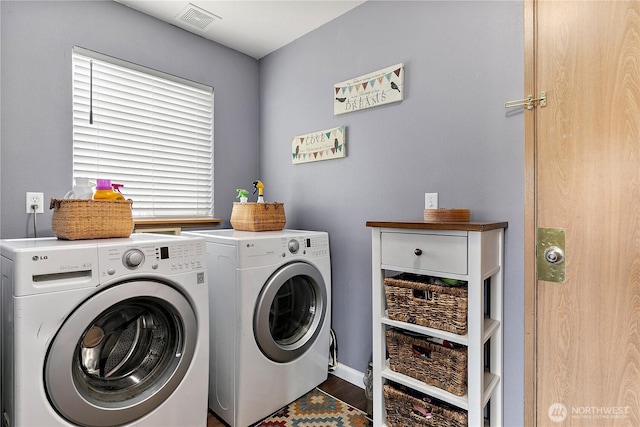 17915 69th Avenue Ct E, Puyallup, WA 98375 - washroom with washer and dryer and wood finished floors
