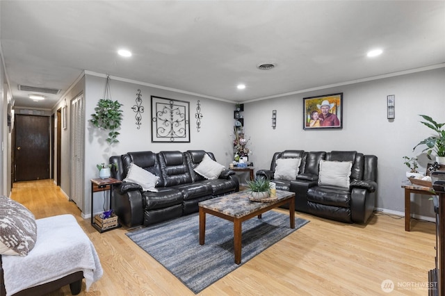322 W 8th St, Warden, WA 98857 - living room with light wood-type flooring, crown molding, and recessed lighting