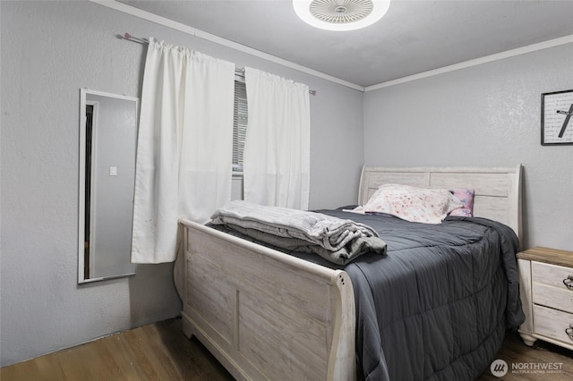 322 W 8th St, Warden, WA 98857 - bedroom with wood finished floors, ornamental molding, and a textured wall