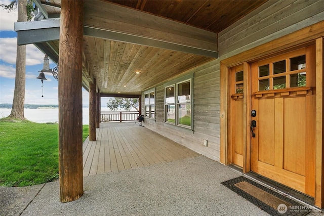 1005 Cavalero Rd, Camano Island, WA 98282 - wooden terrace featuring a porch and a water view