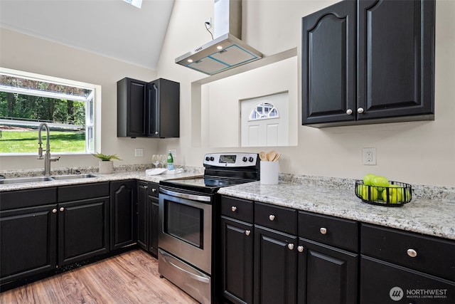 15802 67th Ave NW, Gig Harbor, WA 98332 - kitchen with electric range, a sink, ventilation hood, dark cabinetry, and light wood finished floors