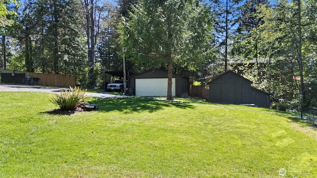 15802 67th Ave NW, Gig Harbor, WA 98332 - view of yard with an outdoor structure, a barn, and a garage