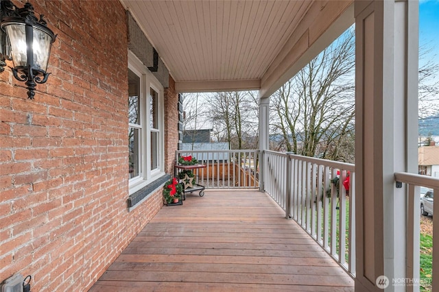 640 N Elm St, Colville, WA 99114 - wooden deck with a porch