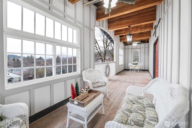 640 N Elm St, Colville, WA 99114 - sunroom / solarium with ceiling fan, wood finished floors, and beam ceiling