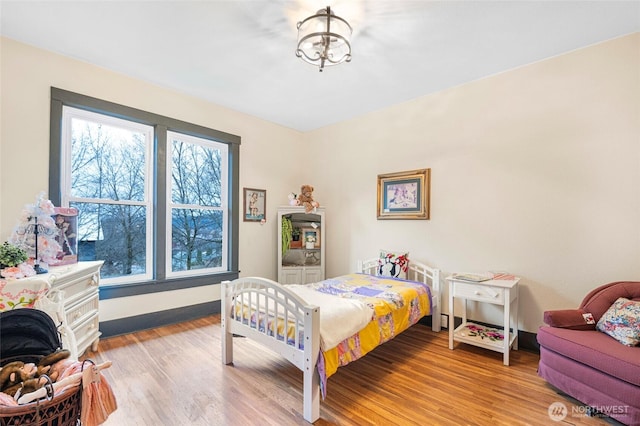 640 N Elm St, Colville, WA 99114 - bedroom with baseboards and light wood finished floors