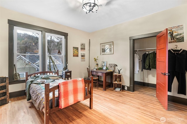 640 N Elm St, Colville, WA 99114 - bedroom with baseboards and light wood-type flooring