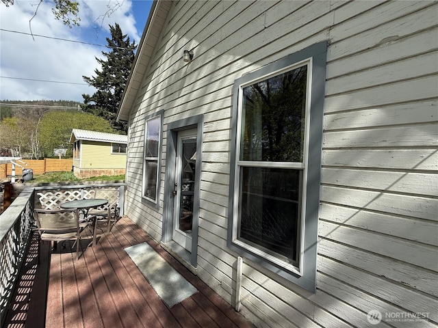 640 N Elm St, Colville, WA 99114 - view of side of home with a deck and fence
