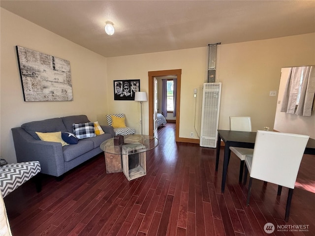 640 N Elm St, Colville, WA 99114 - living area with a heating unit, wood finished floors, and baseboards