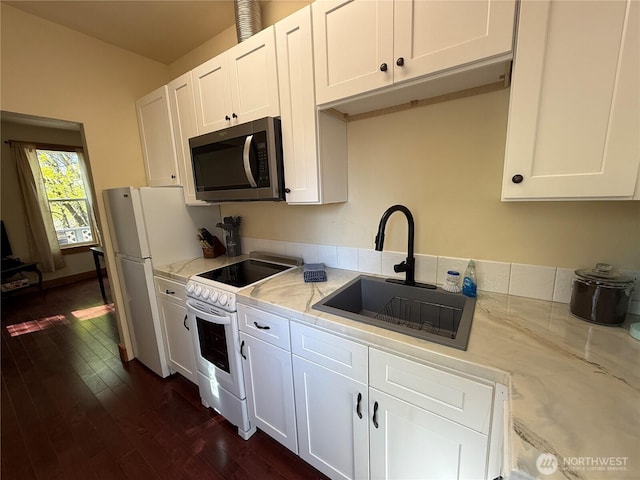 640 N Elm St, Colville, WA 99114 - kitchen featuring light stone countertops, white appliances, a sink, dark wood-type flooring, and white cabinets