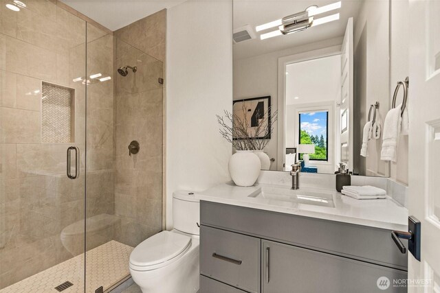 8458 NE 9th St, Medina, WA 98039 - bathroom featuring a shower stall, toilet, and vanity