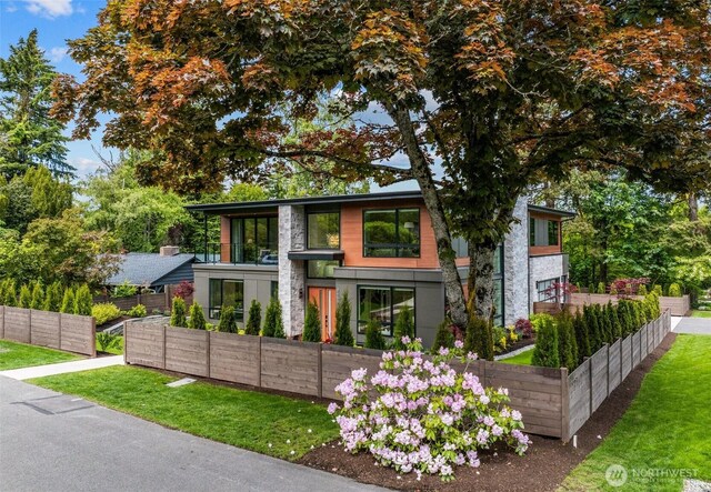 8458 NE 9th St, Medina, WA 98039 - modern home with a garden