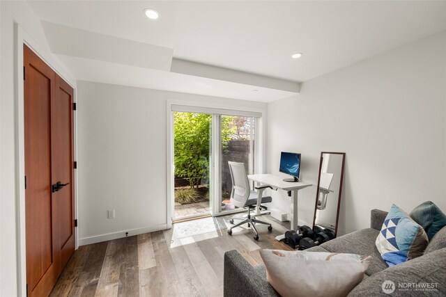 home office with wood finished floors, baseboards, and recessed lighting
