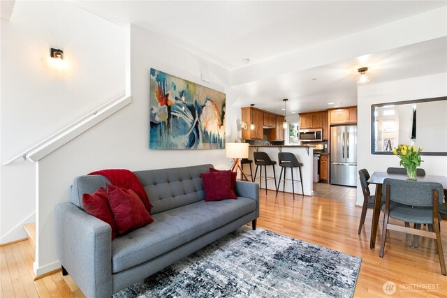 418 11th Ave E Unit B, Seattle, WA 98102 - living room featuring light wood finished floors