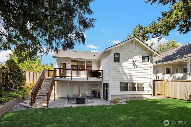 back of house featuring stairs, a patio area, and board and batten siding
