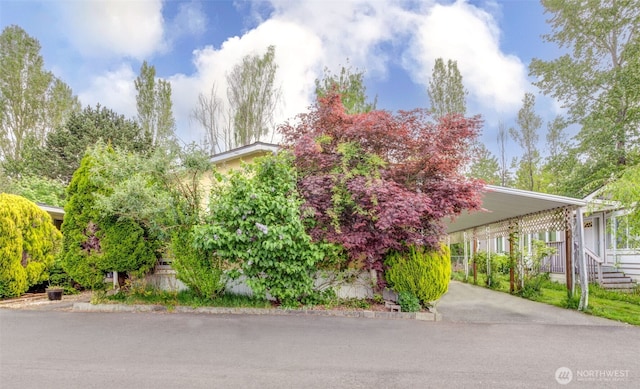 415 Lake View Rd Unit K8, Lynnwood, WA 98087 - view of side of property with driveway and an attached carport