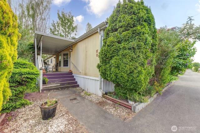 415 Lake View Rd Unit K8, Lynnwood, WA 98087 - view of side of home featuring covered porch