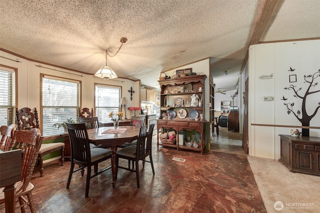 415 Lake View Rd Unit K8, Lynnwood, WA 98087 - dining room with a textured ceiling and ornamental molding