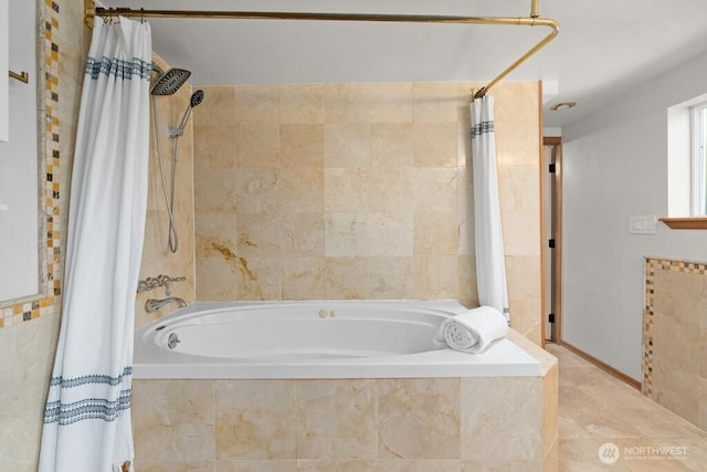 full bathroom featuring tiled shower / bath combo