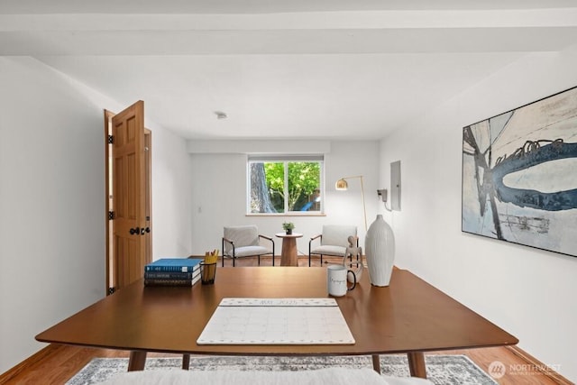 office space with wood finished floors