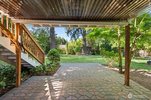view of patio featuring stairway