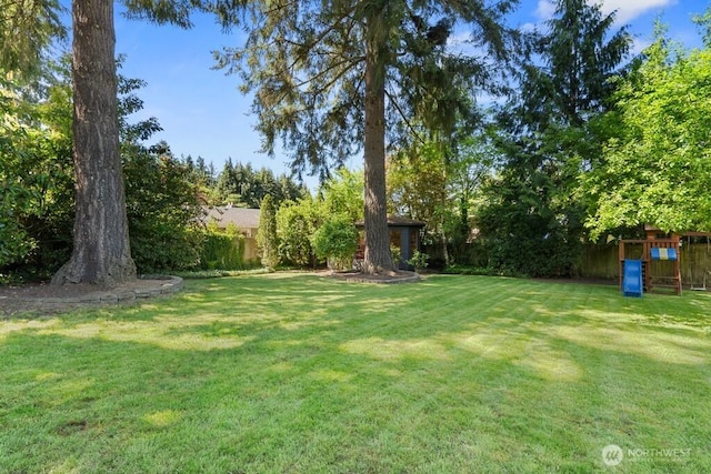 view of yard with fence