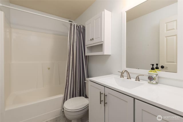 bathroom with toilet, vanity, and shower / bath combo with shower curtain