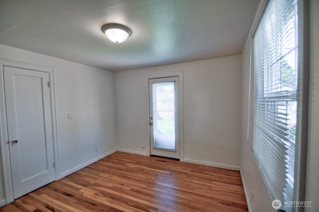 819 Decatur St SW, Olympia, WA 98502 - unfurnished room featuring baseboards, visible vents, and wood finished floors