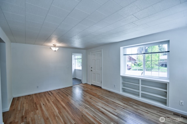 819 Decatur St SW, Olympia, WA 98502 - interior space featuring wood-type flooring, baseboards, and visible vents