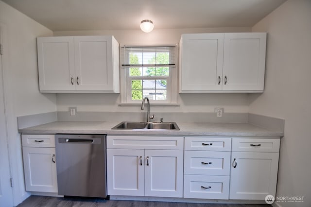 819 Decatur St SW, Olympia, WA 98502 - kitchen with a sink, stainless steel dishwasher, and white cabinets