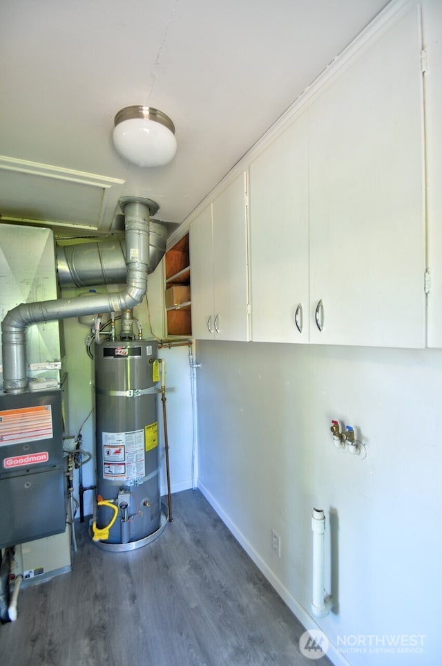 819 Decatur St SW, Olympia, WA 98502 - utility room with heating unit and strapped water heater
