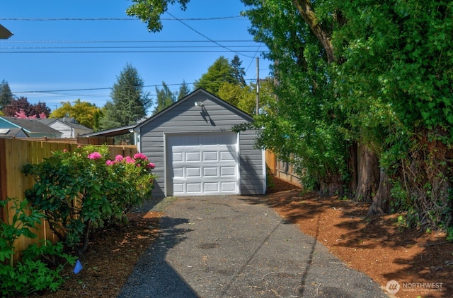 819 Decatur St SW, Olympia, WA 98502 - detached garage featuring concrete driveway and fence