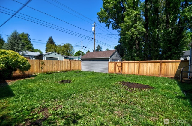 819 Decatur St SW, Olympia, WA 98502 - view of yard featuring a fenced backyard and an outdoor structure