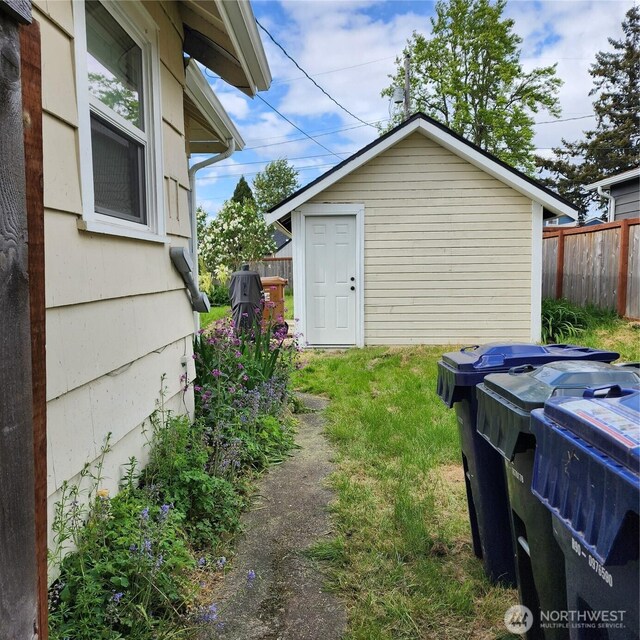 705 E 54th St, Tacoma, WA 98404 - view of outdoor structure with an outbuilding