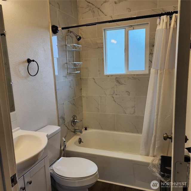705 E 54th St, Tacoma, WA 98404 - bathroom featuring shower / bath combo with shower curtain, toilet, vanity, and a textured wall
