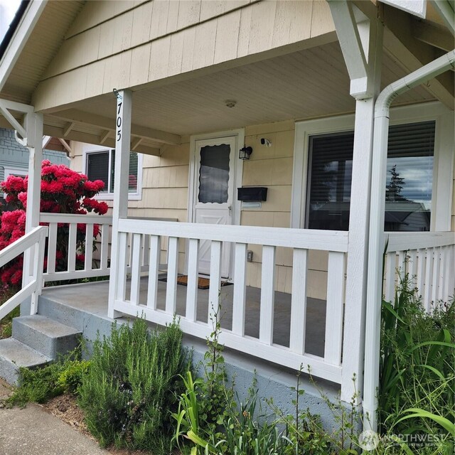 705 E 54th St, Tacoma, WA 98404 - doorway to property with a porch