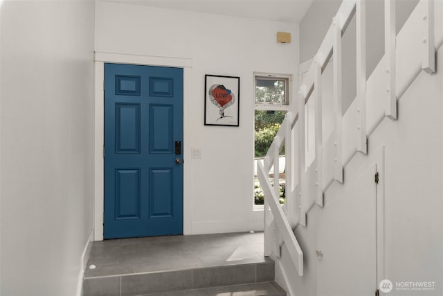 716 W Argand St Unit C, Seattle, WA 98119 - foyer featuring baseboards and stairs