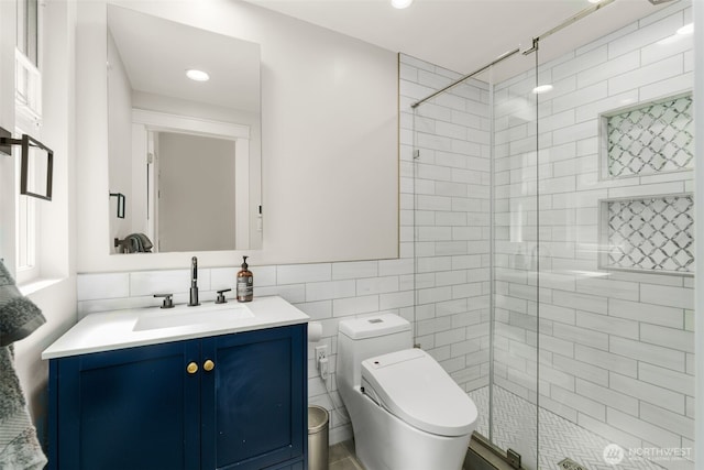 716 W Argand St Unit C, Seattle, WA 98119 - full bath with a stall shower, tile walls, toilet, vanity, and recessed lighting