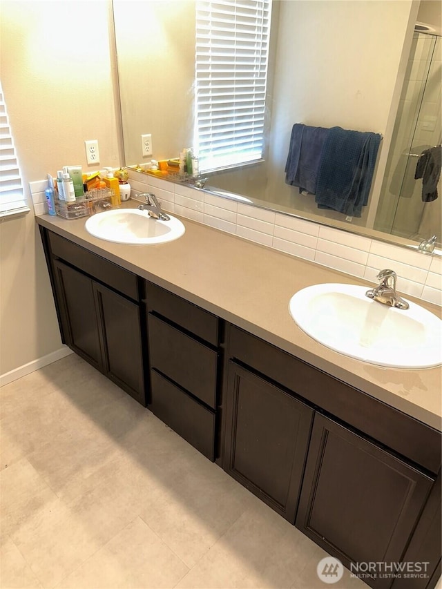 10823 187th Street Ct E, Puyallup, WA 98374 - bathroom with a shower stall, double vanity, and backsplash
