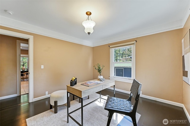 home office with wood finished floors, baseboards, and crown molding