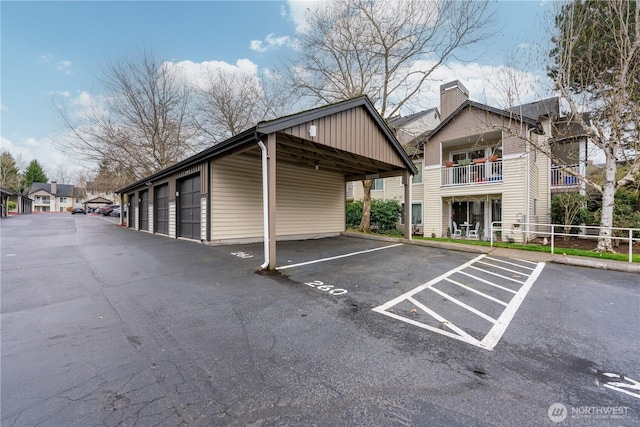 12303 Harbour Pointe Blvd Unit U202, Mukilteo, WA 98275 - parking lot featuring fence
