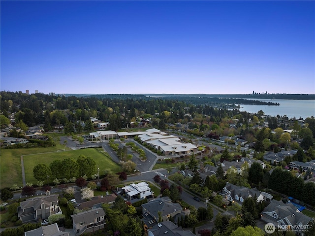 bird's eye view with a water view