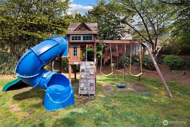 view of playground with a lawn